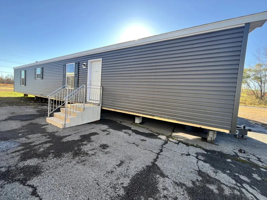 The SAPPHIRE Exterior. This Manufactured Mobile Home features 3 bedrooms and 2 baths.