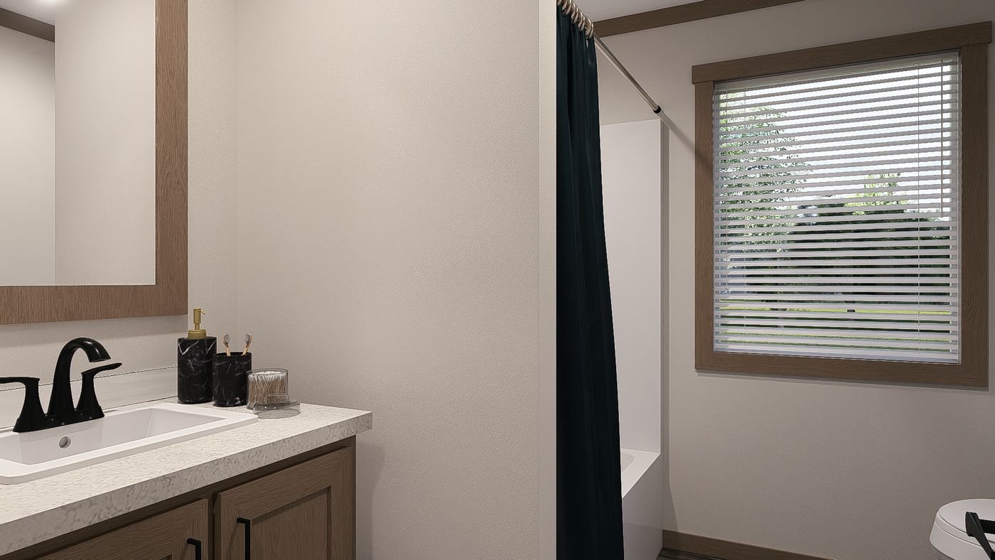 The TINSLEY Exterior. This Manufactured Mobile Home features 4 bedrooms and 2 baths.
