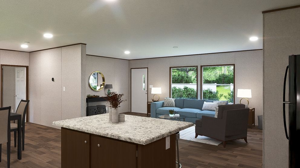 The SPRUCE Exterior. This Manufactured Mobile Home features 3 bedrooms and 2 baths.