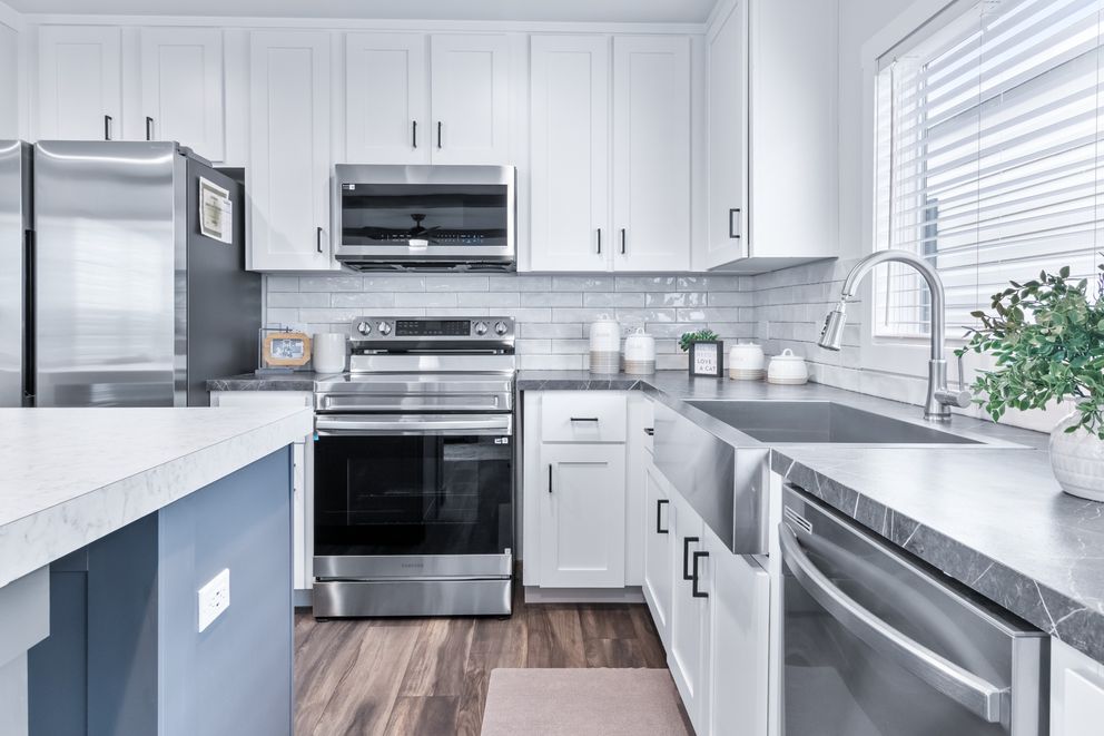 The LEXI Exterior. This Manufactured Mobile Home features 3 bedrooms and 2 baths.