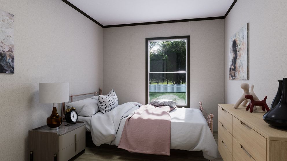 The PURPOSE Exterior. This Manufactured Mobile Home features 4 bedrooms and 2 baths.
