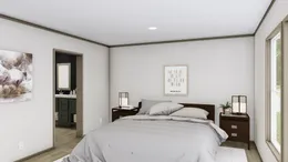 The COOK Exterior. This Manufactured Mobile Home features 3 bedrooms and 2 baths.
