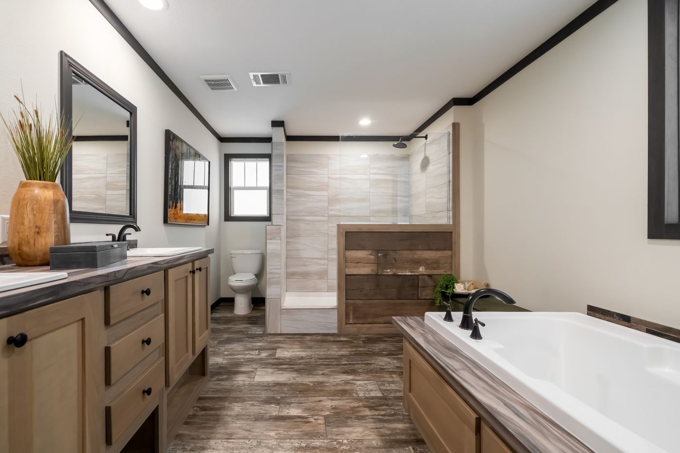 The BOUJEE LUX Exterior. This Manufactured Mobile Home features 4 bedrooms and 3 baths.