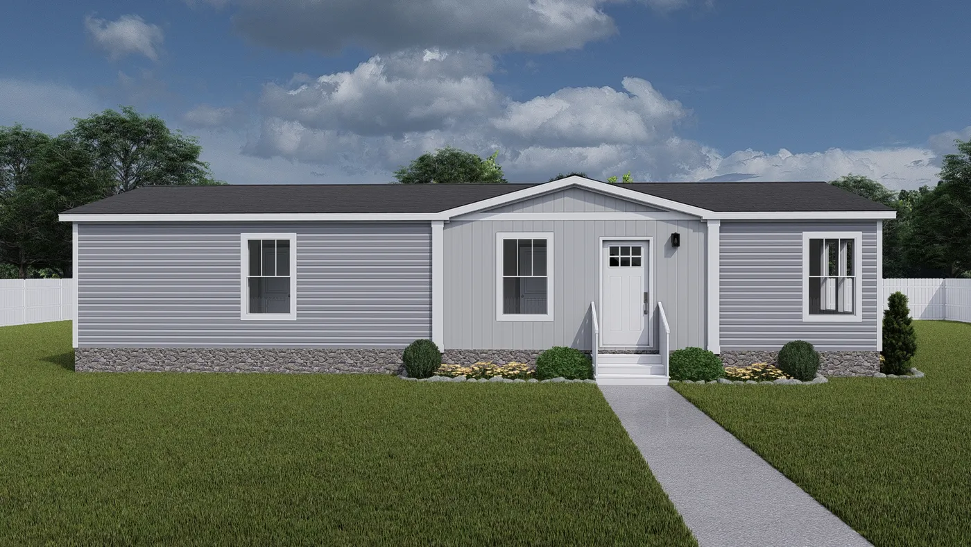 The THREE LITTLE BIRDS Exterior. This Manufactured Mobile Home features 3 bedrooms and 2 baths.