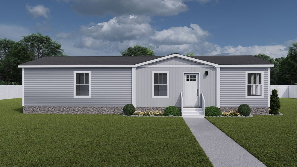 The THREE LITTLE BIRDS Exterior. This Manufactured Mobile Home features 3 bedrooms and 2 baths.