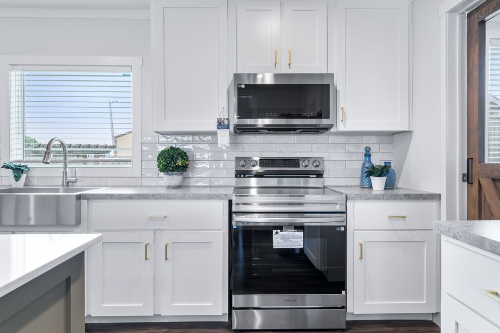 The LIZZIE Exterior. This Manufactured Mobile Home features 3 bedrooms and 2 baths.