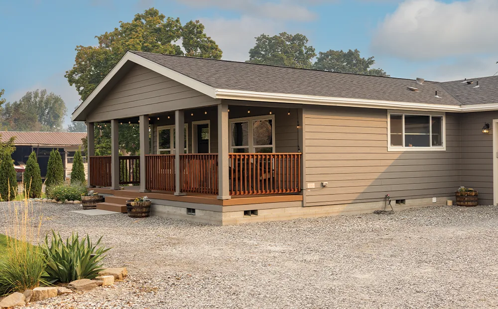 The INS561F SPRUCE         CLAYTON Exterior. This Manufactured Mobile Home features 3 bedrooms and 2 baths.