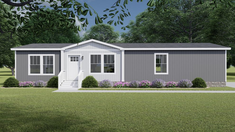 The LET IT BE Exterior. This Manufactured Mobile Home features 3 bedrooms and 2 baths.