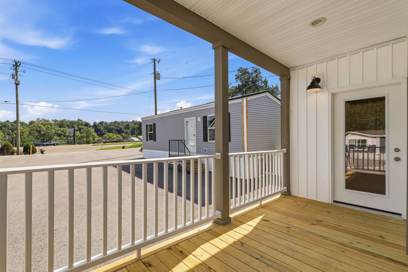 The SOUTHERN CHARM Exterior. This Manufactured Mobile Home features 3 bedrooms and 2 baths.