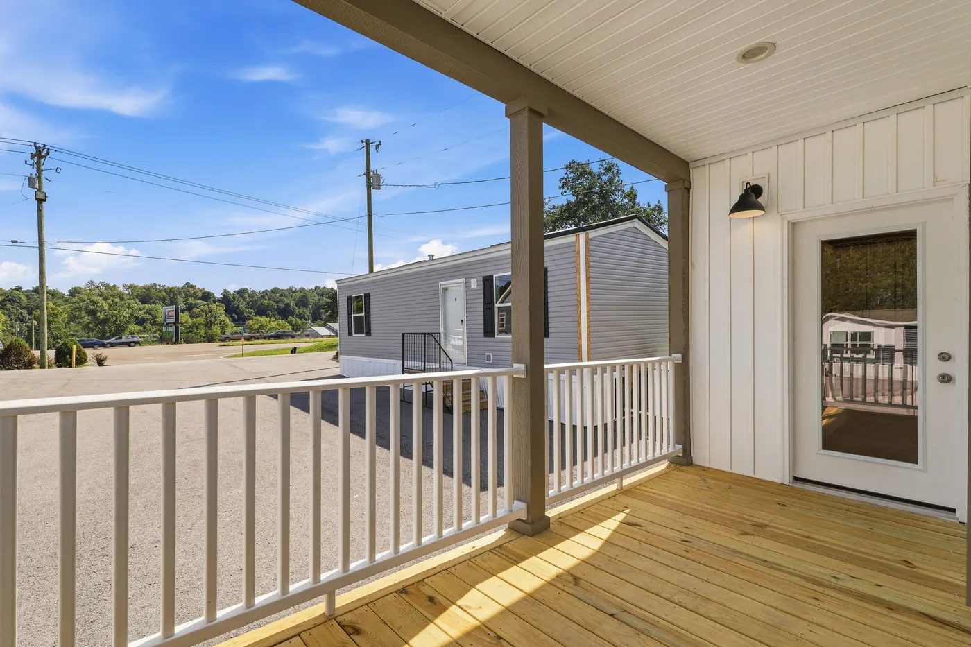 The SOUTHERN CHARM Exterior. This Manufactured Mobile Home features 3 bedrooms and 2 baths.
