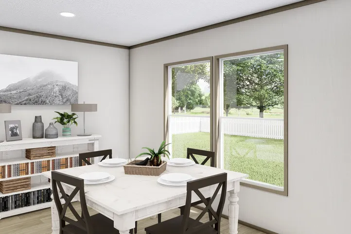 The COOK Exterior. This Manufactured Mobile Home features 3 bedrooms and 2 baths.