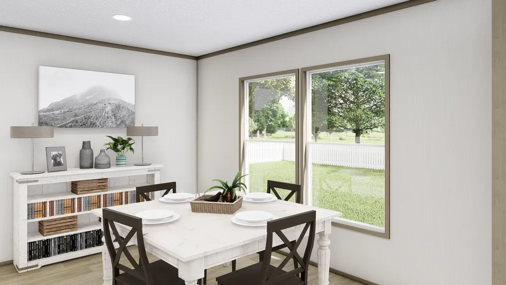The COOK Exterior. This Manufactured Mobile Home features 3 bedrooms and 2 baths.