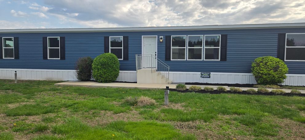 The TOURMALINE 7628-649 Exterior. This Manufactured Mobile Home features 4 bedrooms and 2 baths.