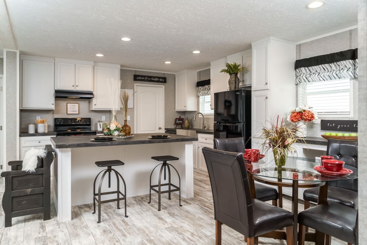 The BENJAMIN Exterior. This Manufactured Mobile Home features 3 bedrooms and 2 baths.