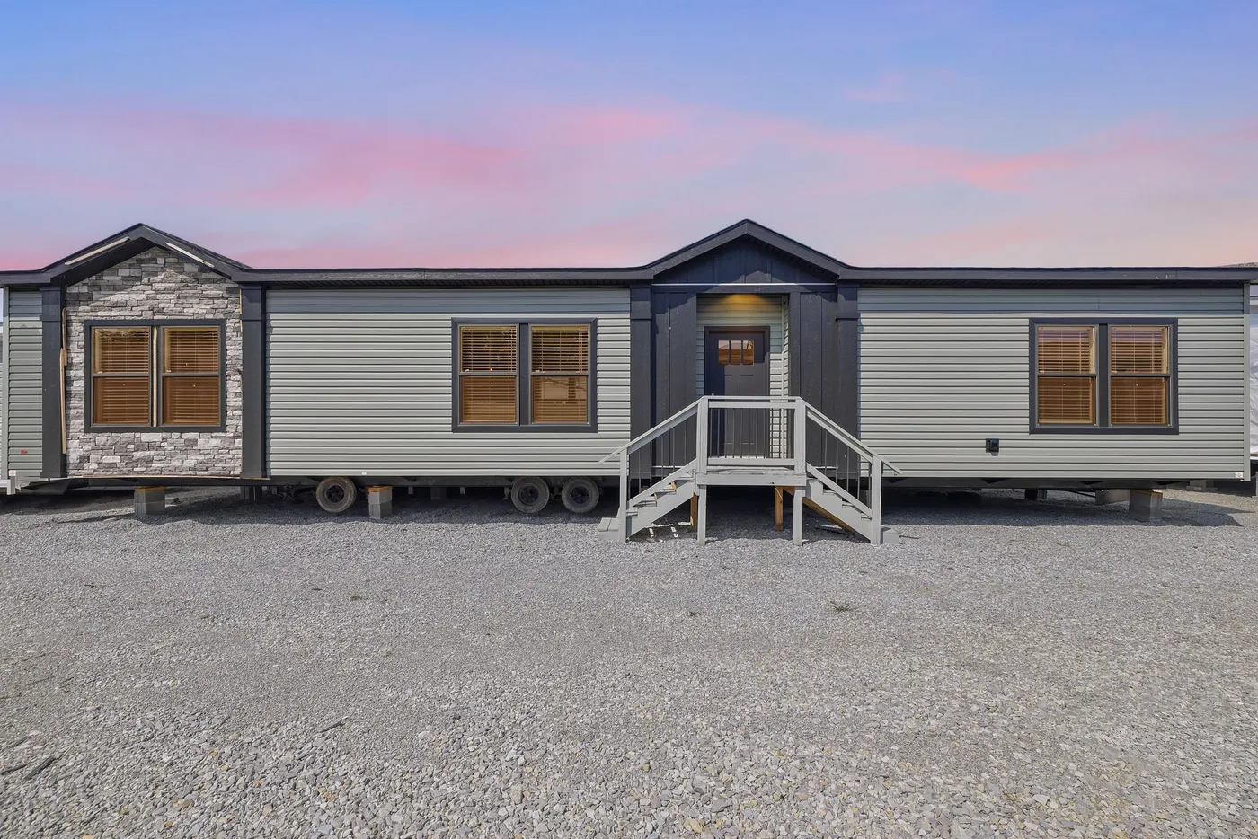 The THE FREEDOM GRAND 4BR 32X62 Exterior. This Manufactured Mobile Home features 4 bedrooms and 2 baths.