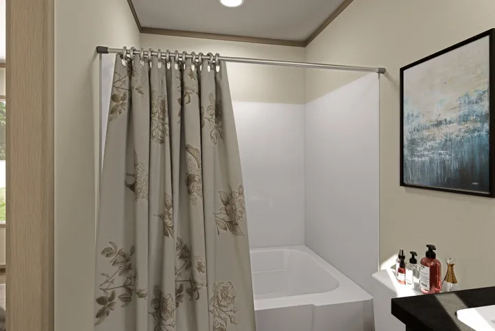 The CORTES Exterior. This Manufactured Mobile Home features 2 bedrooms and 2 baths.