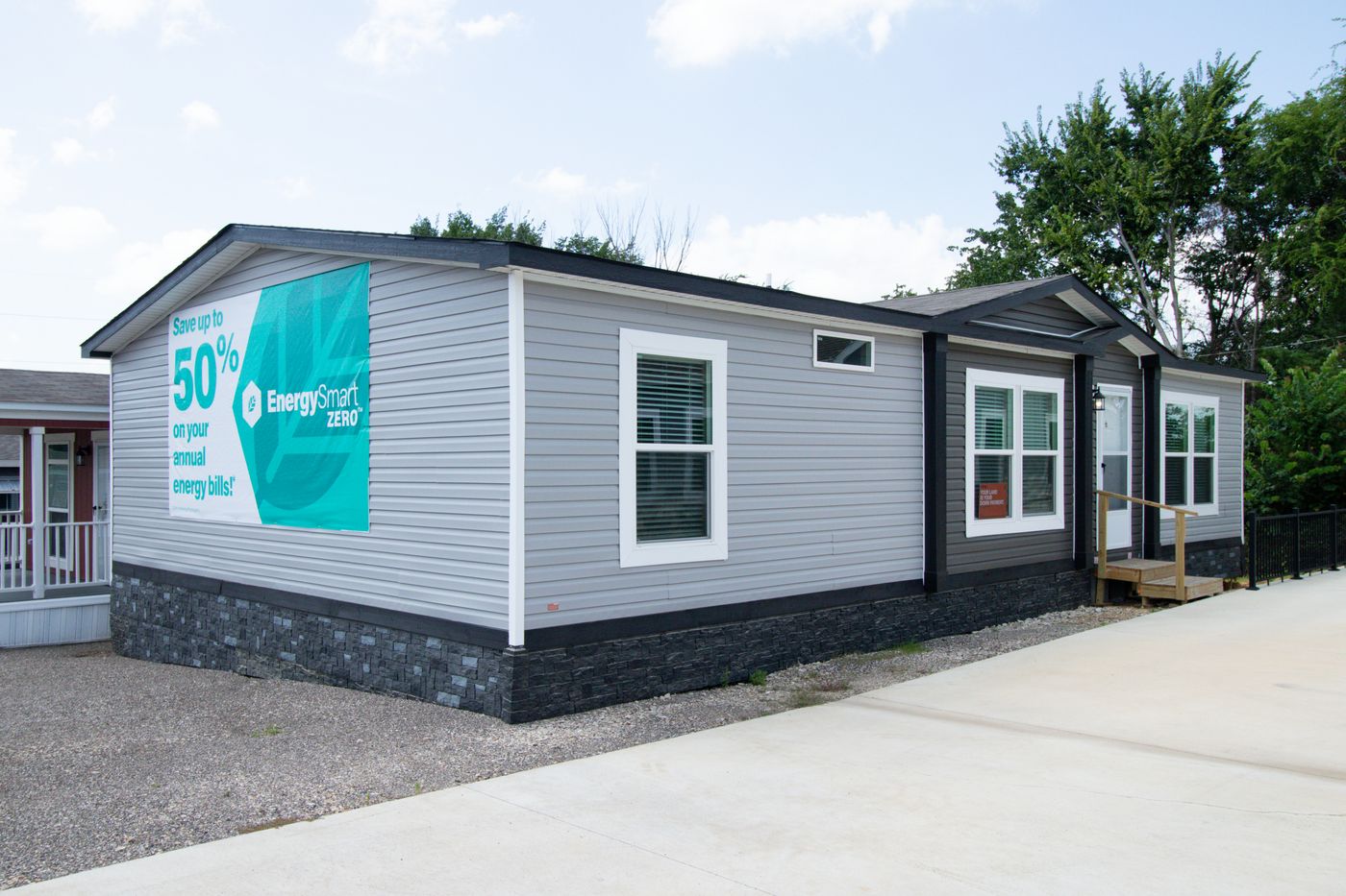 The THE REAL DEAL Exterior. This Manufactured Mobile Home features 3 bedrooms and 2 baths.