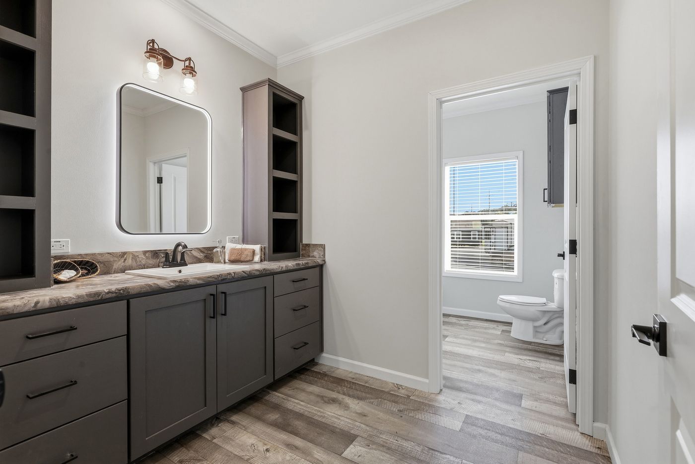 The SUPER 68 ELITE Exterior. This Manufactured Mobile Home features 3 bedrooms and 2 baths.