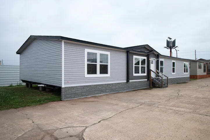 The HERCULES Exterior. This Manufactured Mobile Home features 4 bedrooms and 2 baths.