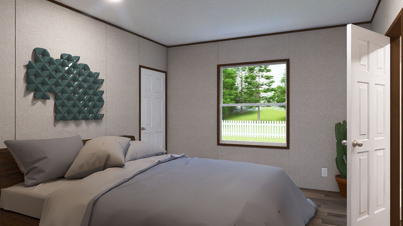 The ASPEN Exterior. This Manufactured Mobile Home features 3 bedrooms and 2 baths.