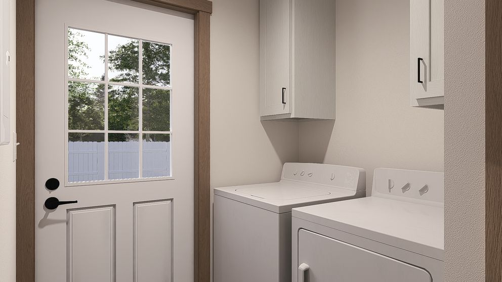 The LEXI Exterior. This Manufactured Mobile Home features 3 bedrooms and 2 baths.