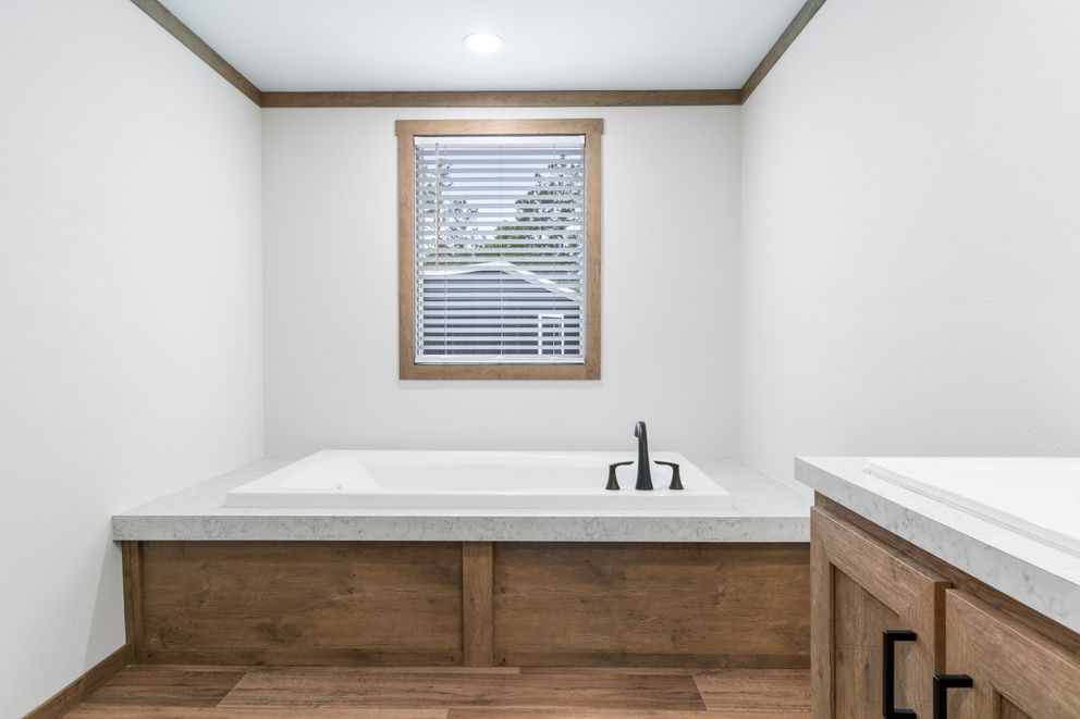 The EMILIE ELITE Exterior. This Manufactured Mobile Home features 3 bedrooms and 2 baths.