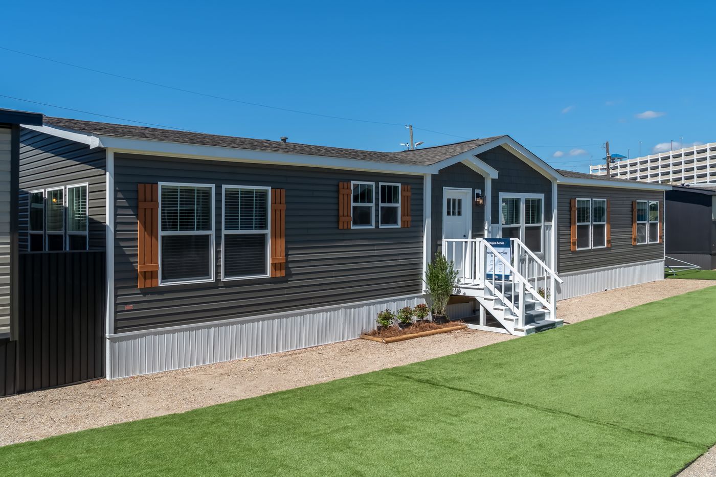 The BOUJEE PREMIER Exterior. This Manufactured Mobile Home features 4 bedrooms and 2 baths.