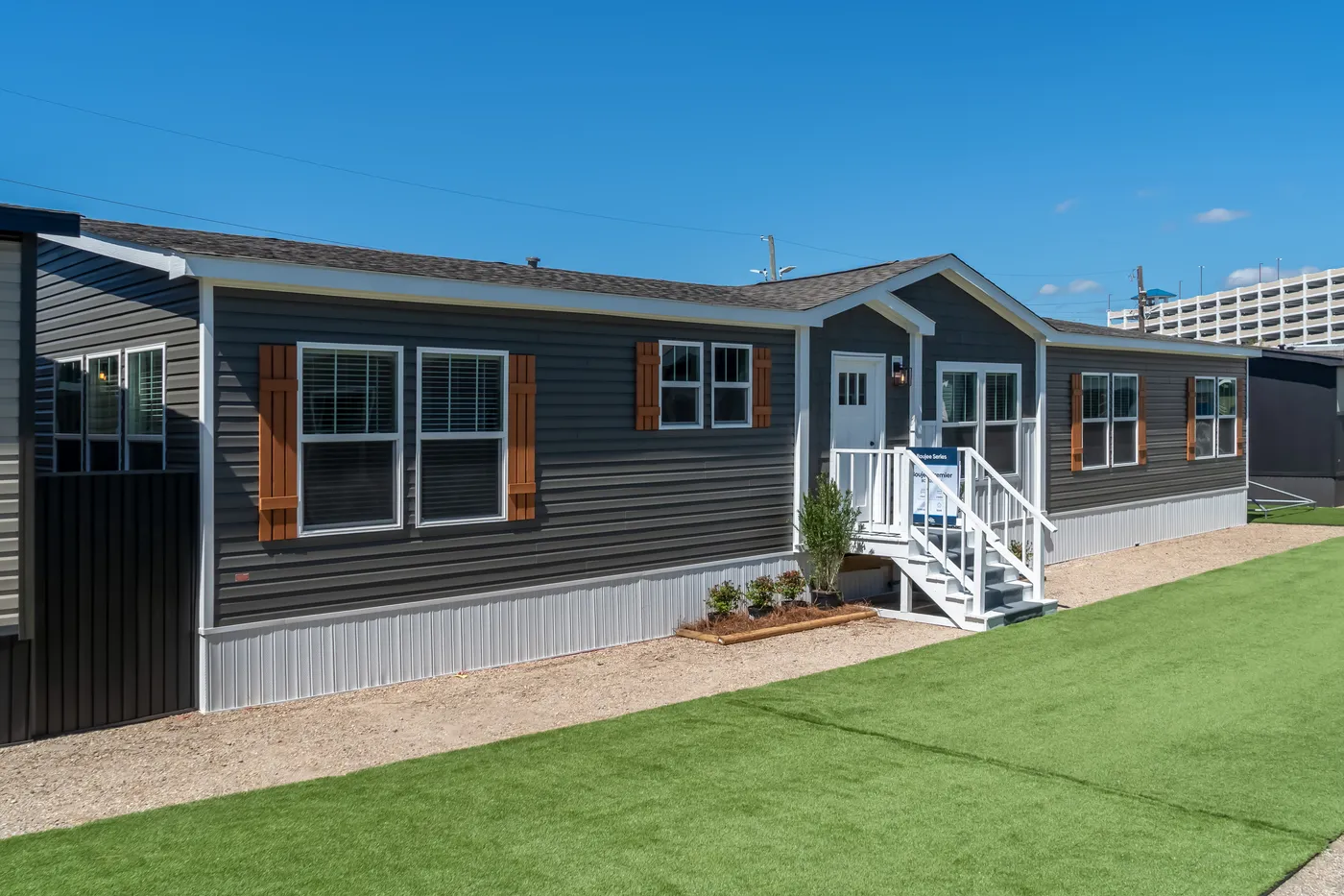The BOUJEE PREMIER Exterior. This Manufactured Mobile Home features 4 bedrooms and 2 baths.