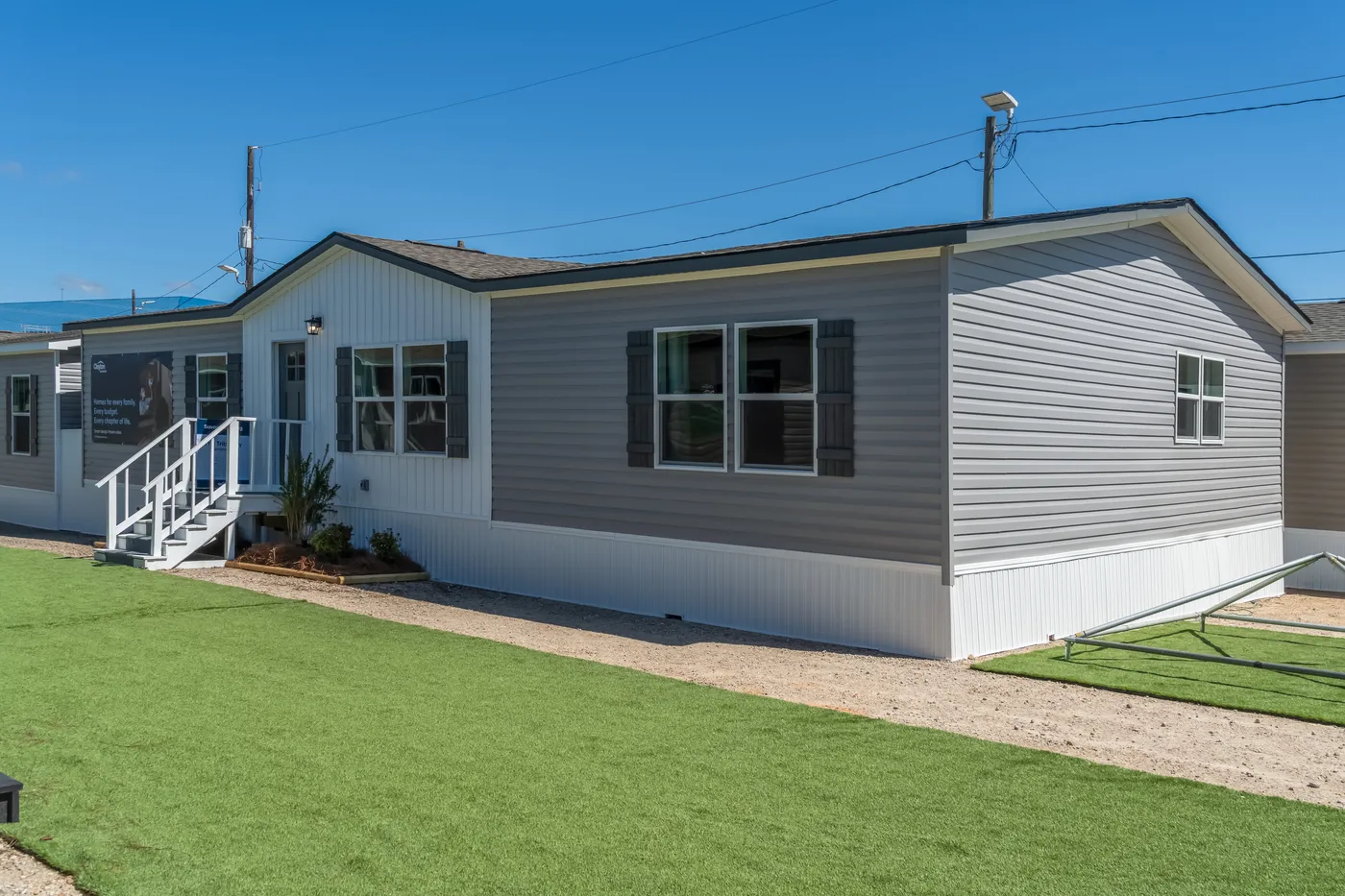 The THE TRIBUTARY Exterior. This Manufactured Mobile Home features 3 bedrooms and 2 baths.