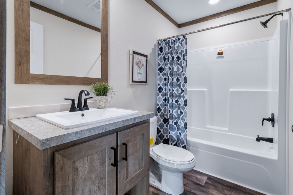 The ISABELLA Exterior. This Manufactured Mobile Home features 3 bedrooms and 2 baths.