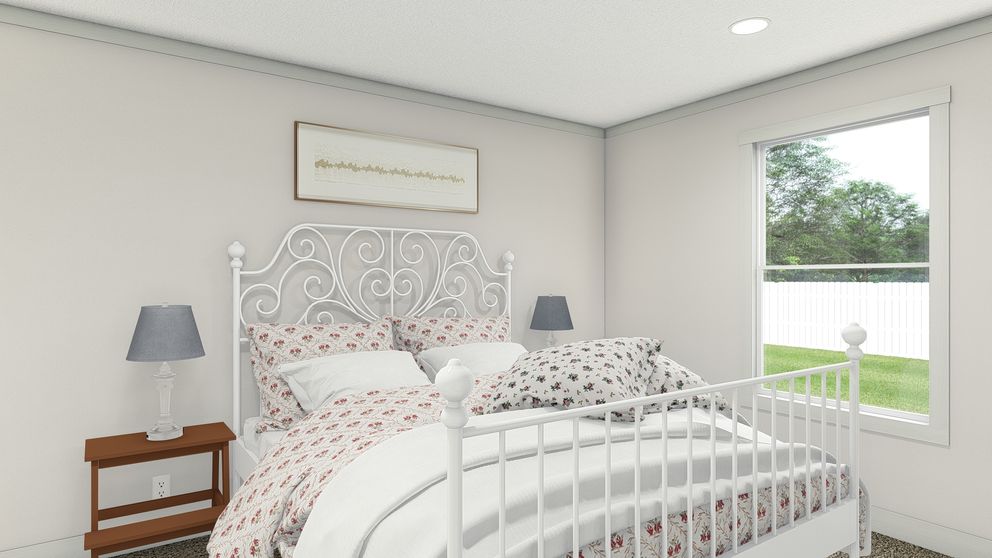 The BEAUTIFUL MORNING Exterior. This Manufactured Mobile Home features 3 bedrooms and 2 baths.