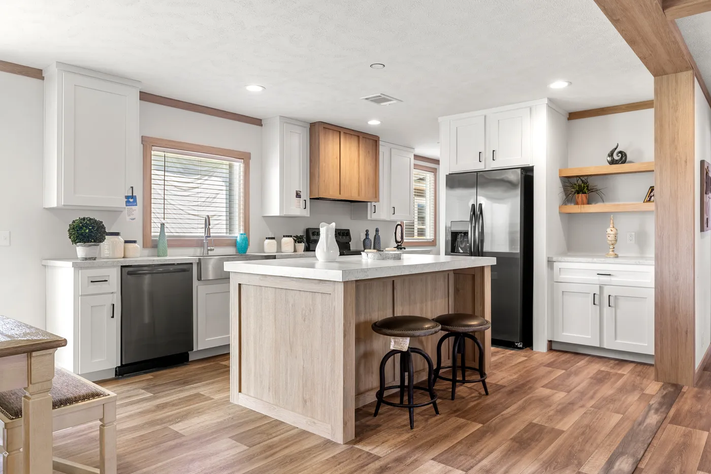 The LIZZIE Exterior. This Manufactured Mobile Home features 3 bedrooms and 2 baths.
