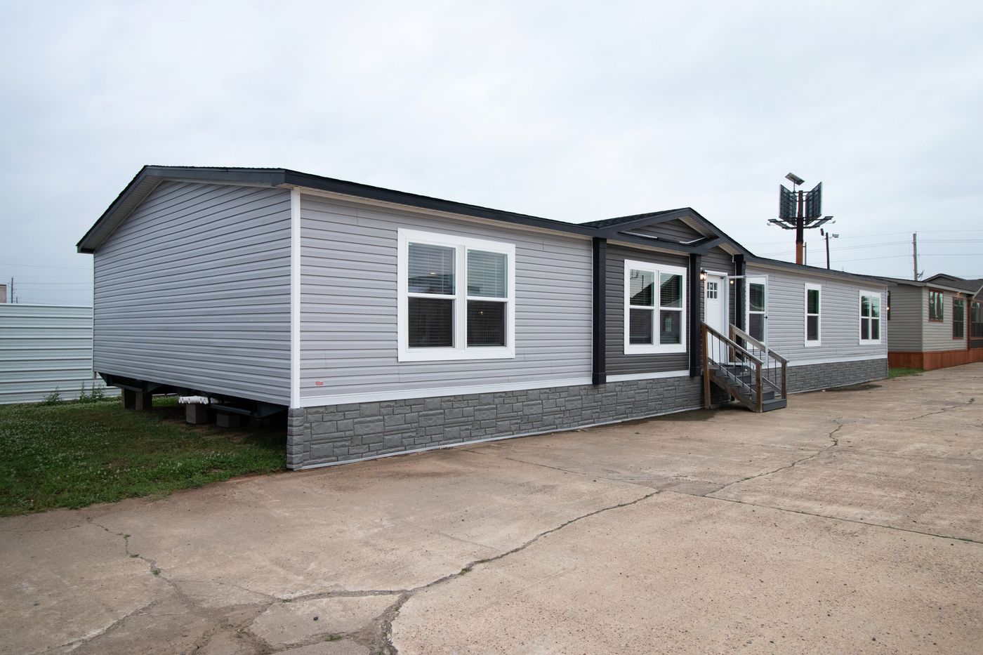 The HERCULES Exterior. This Manufactured Mobile Home features 4 bedrooms and 2 baths.