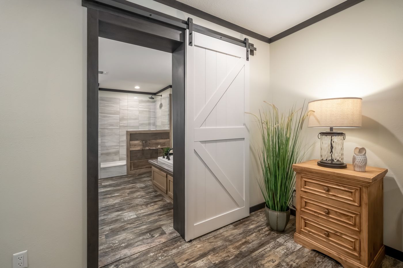 The BOUJEE LUX Exterior. This Manufactured Mobile Home features 4 bedrooms and 3 baths.