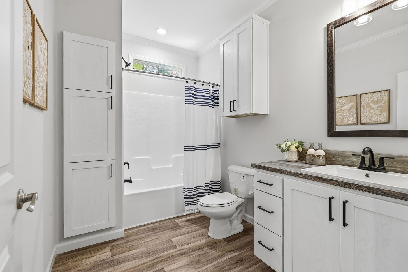The SOUTHERN CHARM Exterior. This Manufactured Mobile Home features 3 bedrooms and 2 baths.