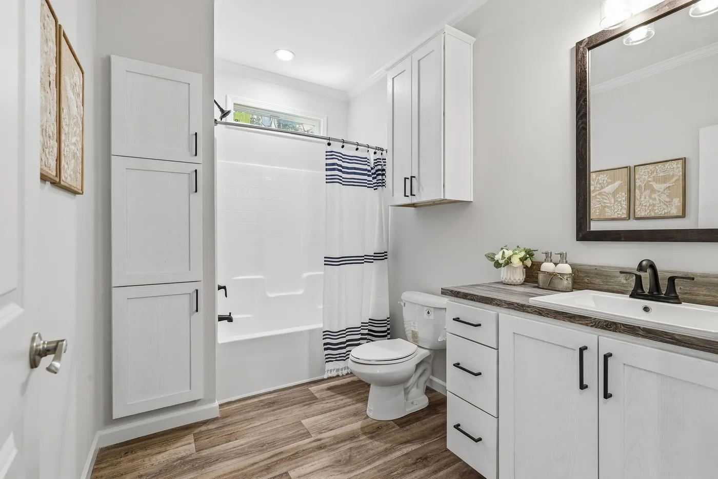 The SOUTHERN CHARM Exterior. This Manufactured Mobile Home features 3 bedrooms and 2 baths.