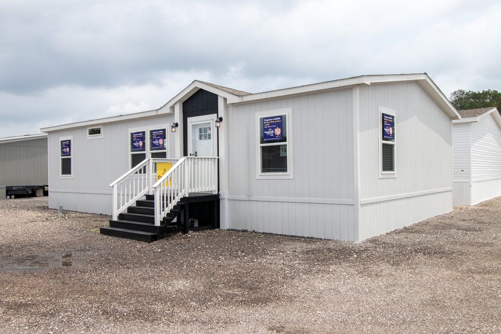 The THE REAL DEAL Exterior. This Manufactured Mobile Home features 3 bedrooms and 2 baths.