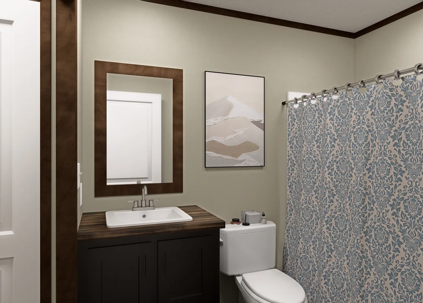 The LEWIS Exterior. This Manufactured Mobile Home features 2 bedrooms and 2 baths.