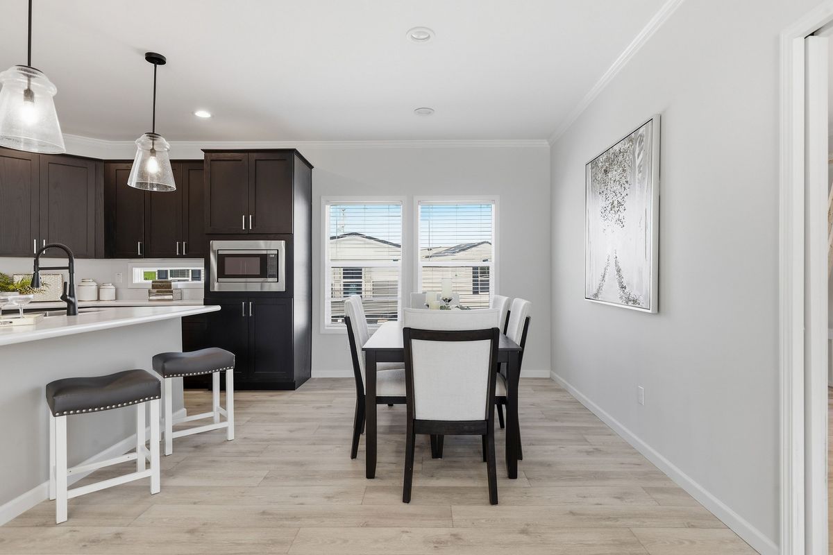The THE FREEDOM GRAND 4BR 32X62 Exterior. This Manufactured Mobile Home features 4 bedrooms and 2 baths.