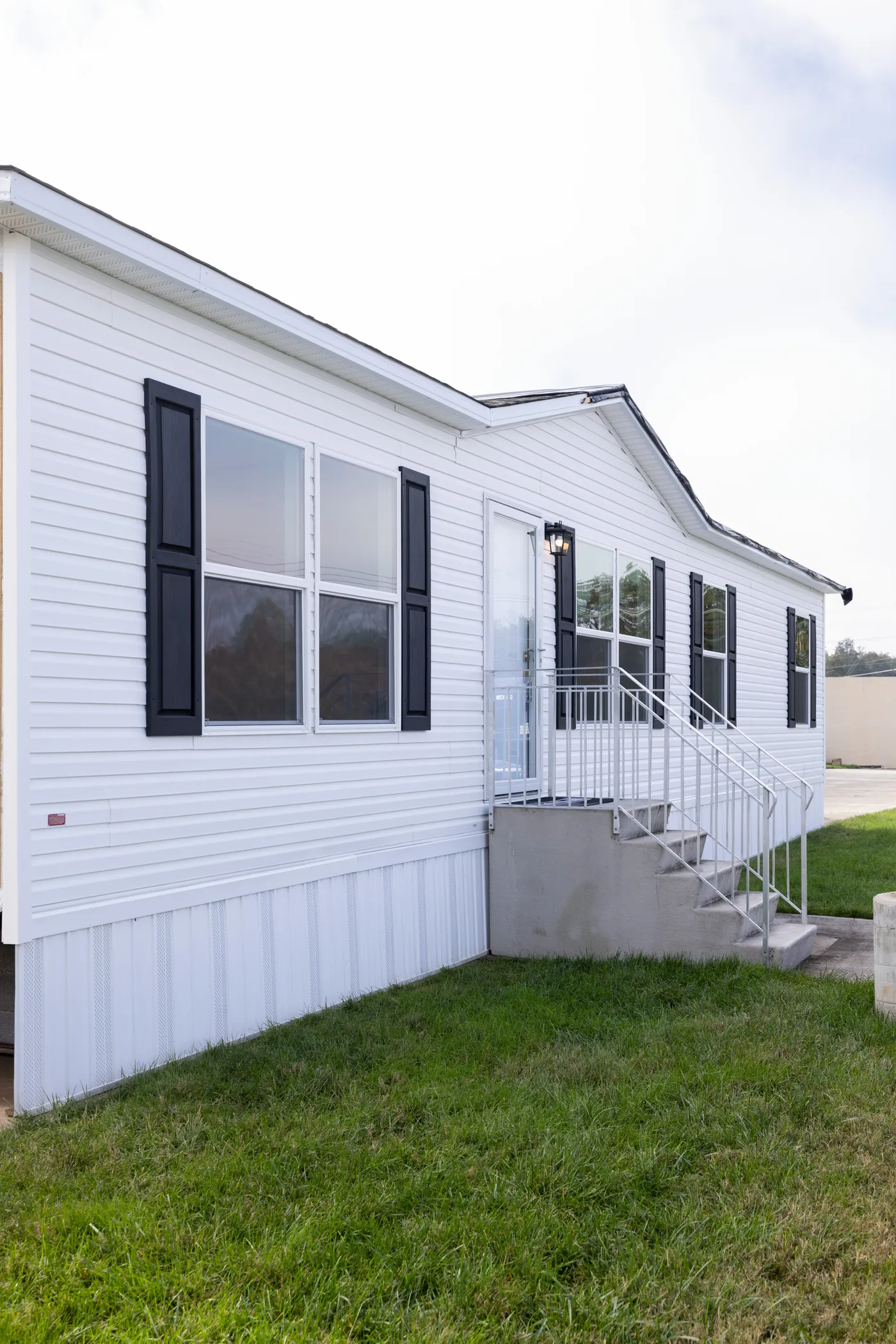 The PLATINUM ANNIVERSARY Exterior. This Manufactured Mobile Home features 3 bedrooms and 2 baths.