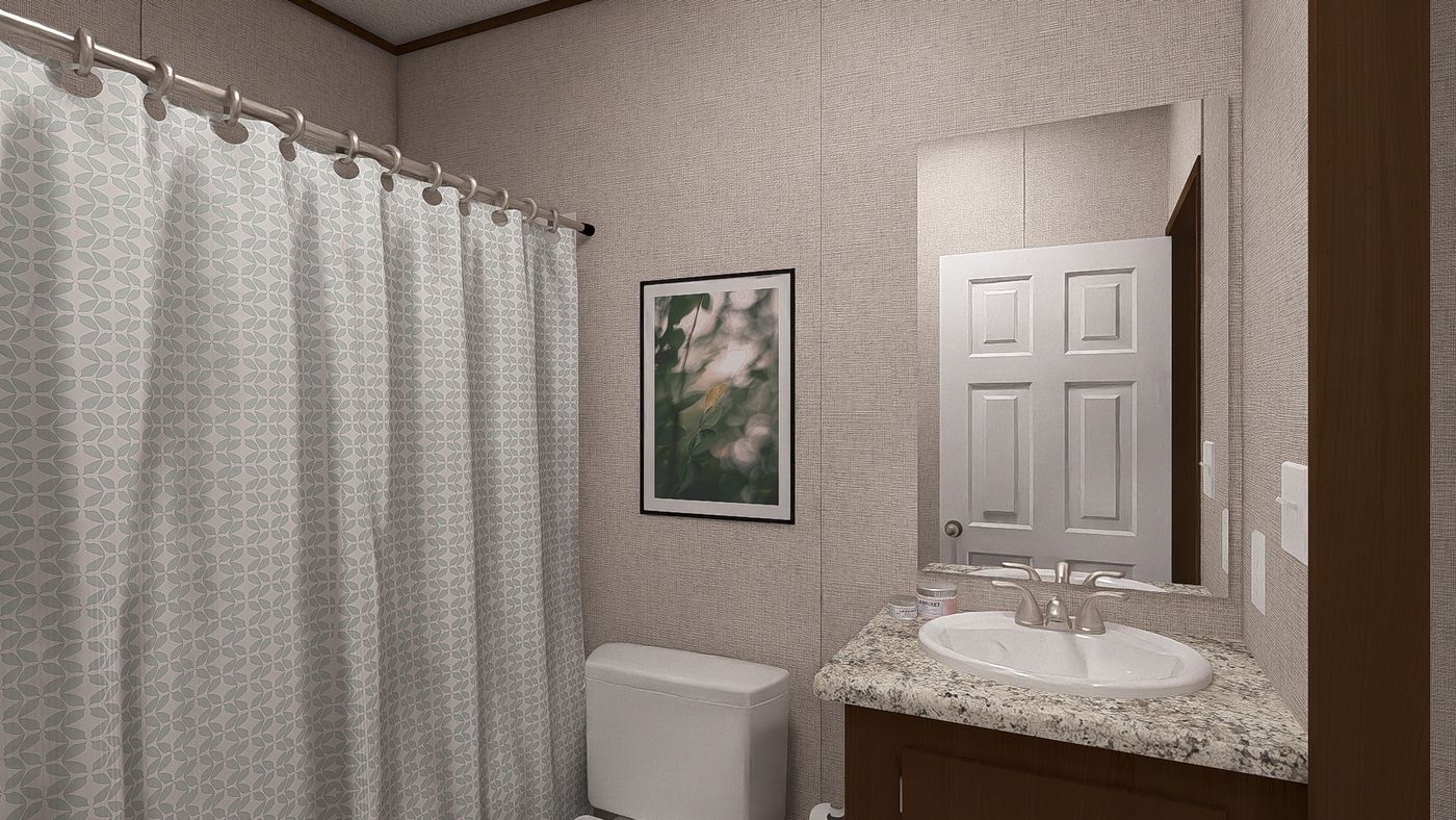 The ASPEN Exterior. This Manufactured Mobile Home features 3 bedrooms and 2 baths.