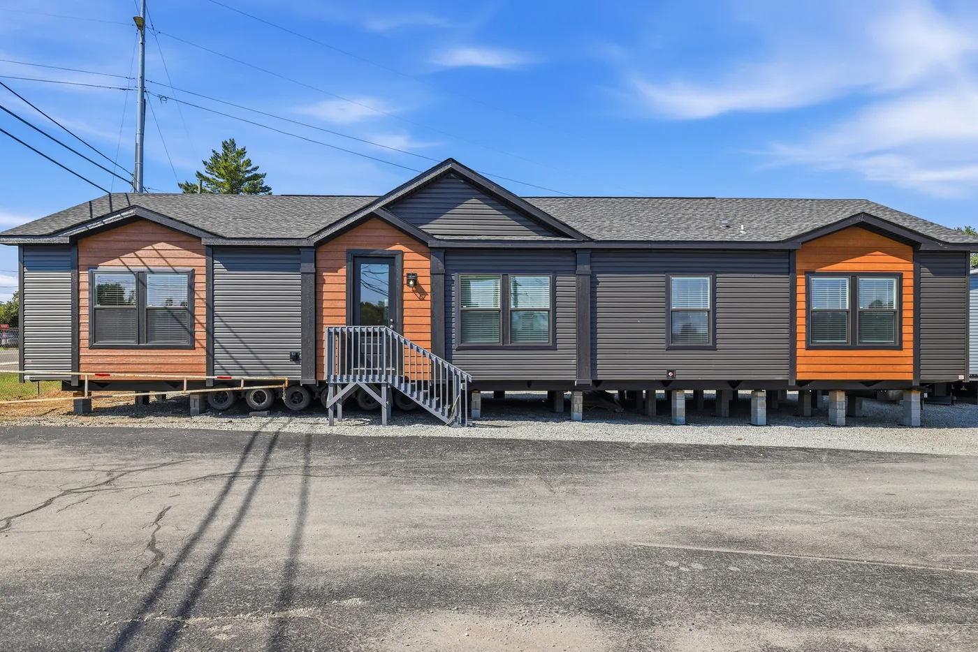 The SUPER 68 ELITE Exterior. This Manufactured Mobile Home features 3 bedrooms and 2 baths.
