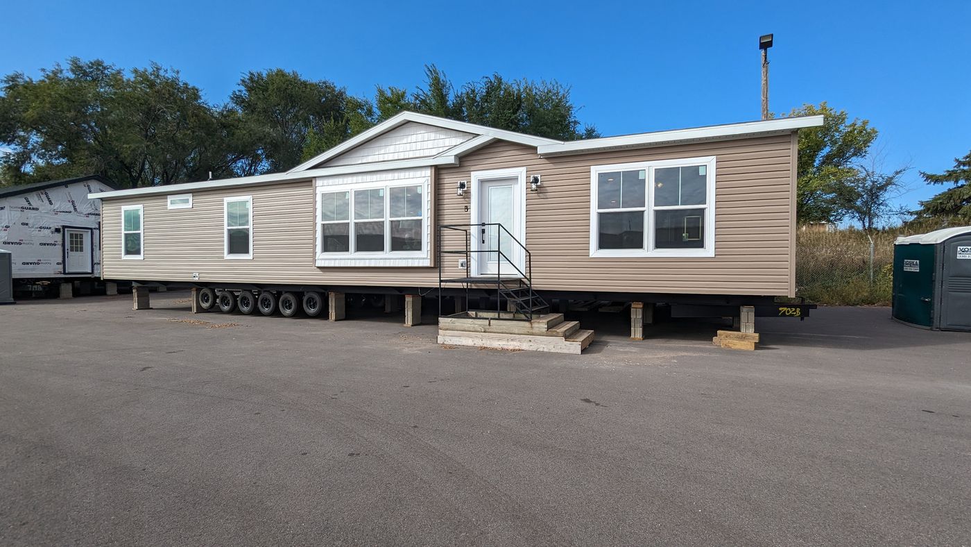 The LEGEND 327-1 Exterior. This Manufactured Mobile Home features 3 bedrooms and 2 baths.