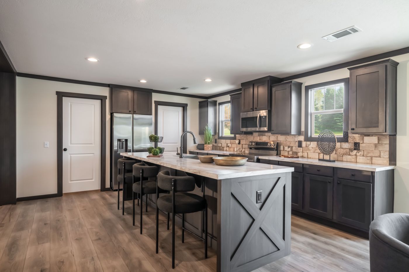 The THE VOGUE 60 Exterior. This Manufactured Mobile Home features 3 bedrooms and 2 baths.