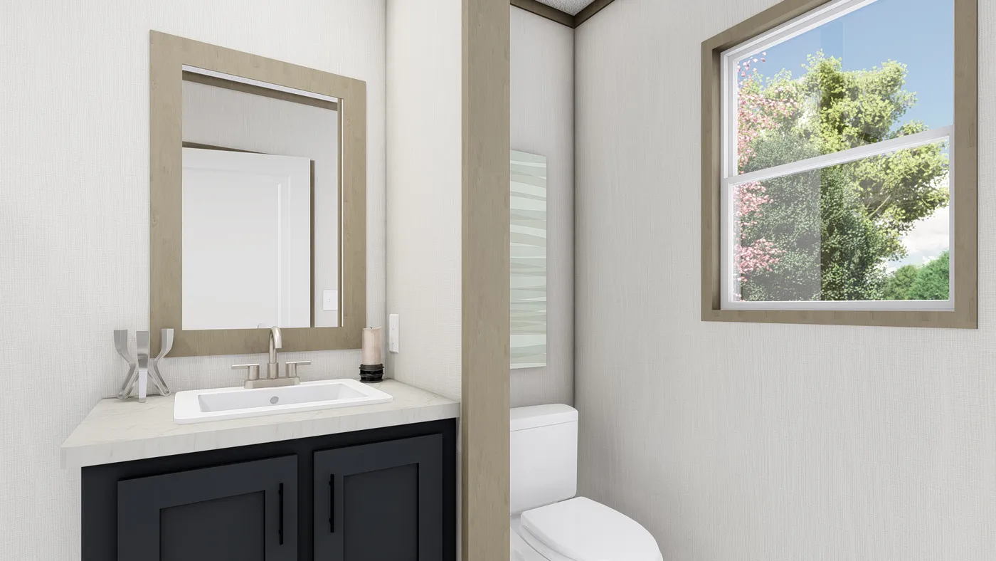 The CLARK Exterior. This Manufactured Mobile Home features 3 bedrooms and 2 baths.