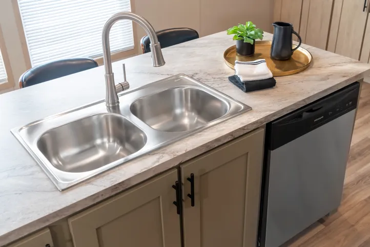 The RAINIER Exterior. This Manufactured Mobile Home features 4 bedrooms and 3 baths.