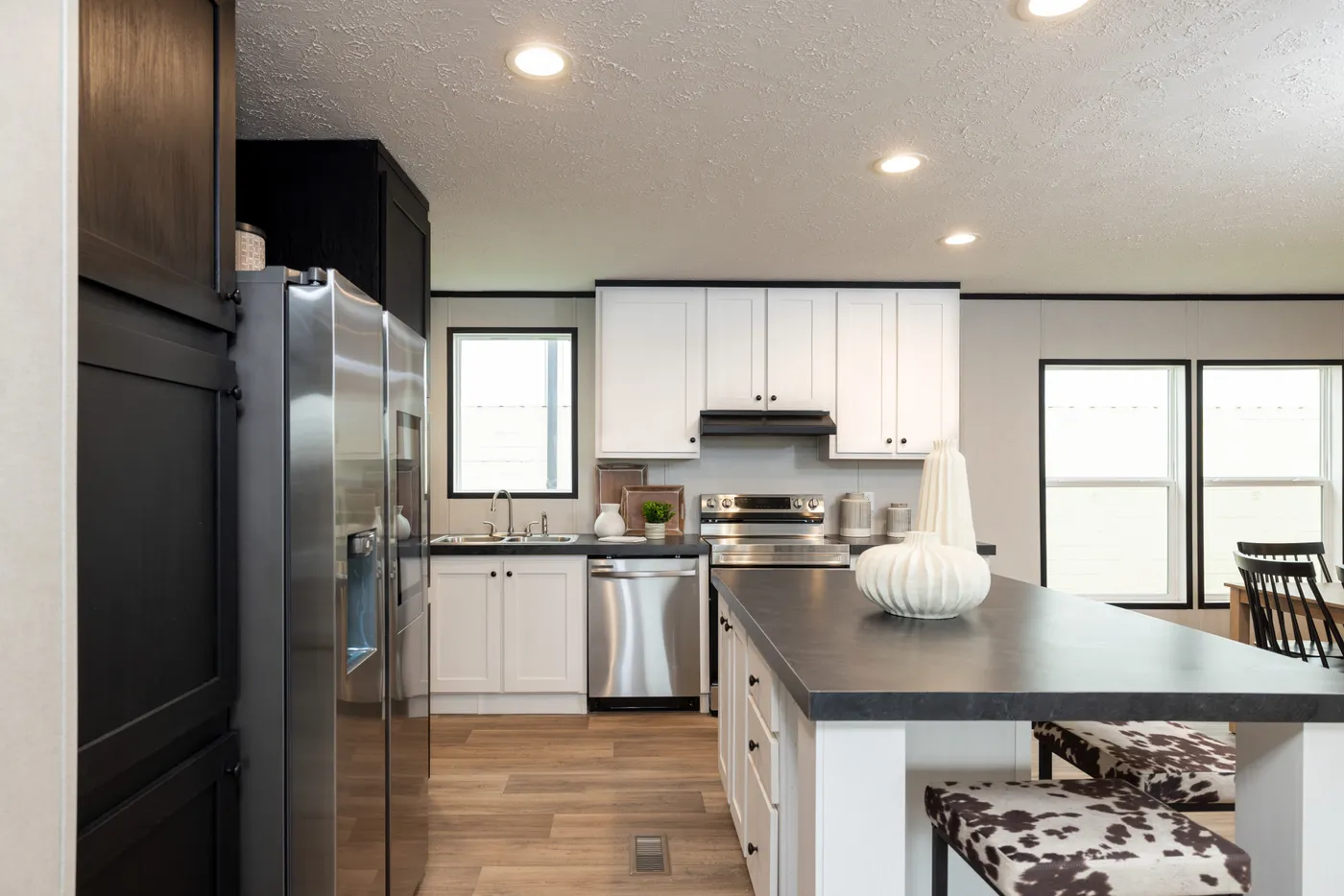 The PLATINUM ANNIVERSARY Exterior. This Manufactured Mobile Home features 3 bedrooms and 2 baths.