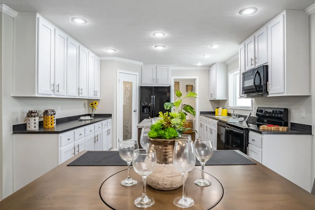 The SANTA FE 684A Exterior. This Manufactured Mobile Home features 4 bedrooms and 2 baths.