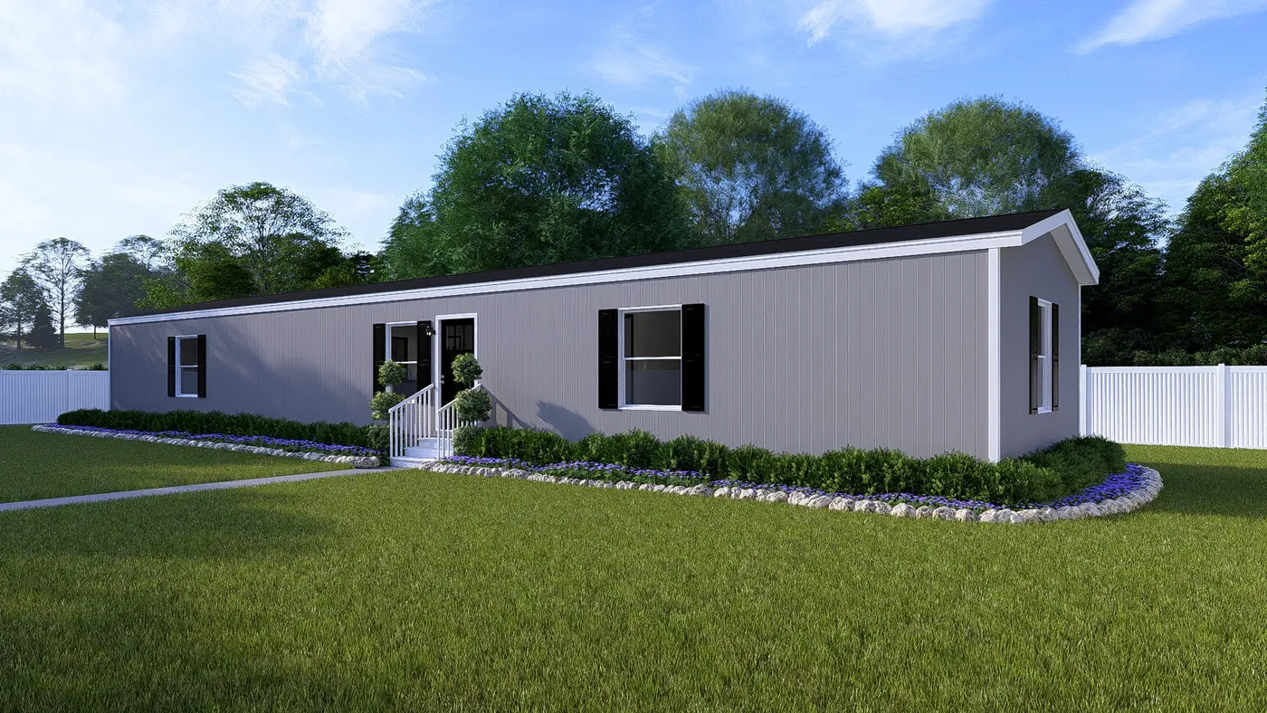 The COLOSSAL Exterior in Flint. This Manufactured Mobile Home features 3 bedrooms and 2 baths.