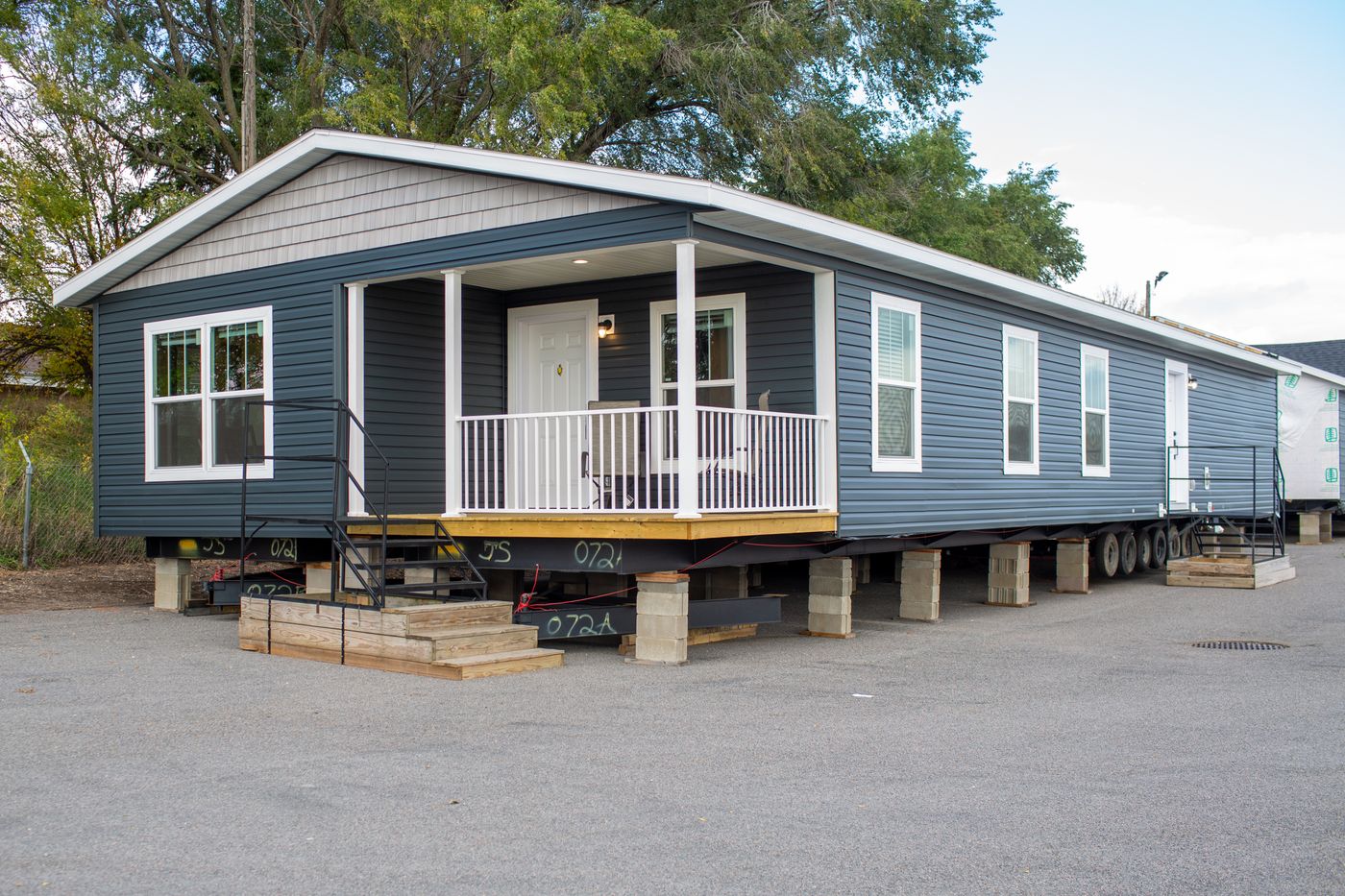 The RAMSEY 75 MOD Exterior. This Modular Home features 4 bedrooms and 2 baths.
